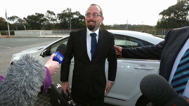 Important brief: Senator Ricky Muir arrives at Parliament House to meet Prime Minister Tony Abbott on Wednesday.