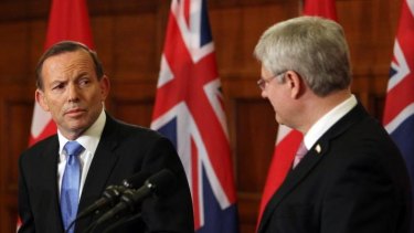 Tony Abbott and Canadian Prime Minister Stephen Harper may see eye to eye on climate issues but Abbott and US president Barack Obama don't.