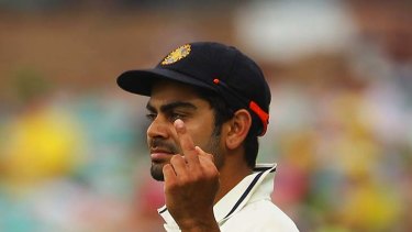 Out of joint: Virat Kohli gestures to the crowd at the SCG yesterday.