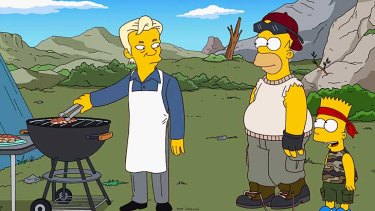 WikiLeaks founder Julian Assange (left) is depicted in <i>The Simpsons</i>.