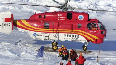 Australian and Chinese rescuers assist stranded crew.