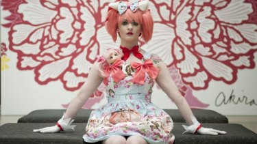 Claire Fulton poses for a portrait during the preview of 'Future beauty: 30 years of Japanese fashion' exhibition at GOMA.
