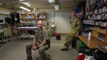 Daily battle ... Captain Anthony Sayce and Captain Antony McNamara in Tarin Kowt, Afghanistan.