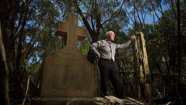 March of time &#8230; the Wollongong mayor, Gordon Bradbery, at the neglected and overgrown Waterfall Cemetery, where 2000 TB victims were buried between 1909 and 1949.