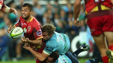Karmichael Hunt playing for Queensland against the Waratahs in June.