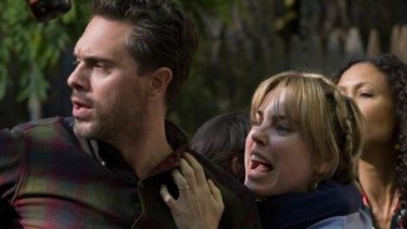 US version of <i>The Slap</i>: Thomas Sadoski as Gary and Melissa George as Rosie at the 40th party where the slap occurs.