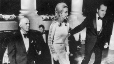 That dress .... Sir William McMahon, then Australian Prime Minister, and Sonia McMahon escorted into the White House in 1971.