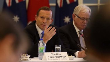 Cosying up to Canada: Tony Abbott.