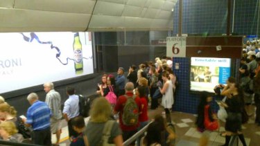 Crowds gather in Brisbane's Central Station in a bid to flee the CBD.