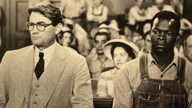 Literary mystery ... Gregory Peck  and Brock Peters in a scene from the 1962 film <i>To Kill a Mockingbird</i>.