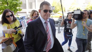 Peter Slipper arrives at the ACT Magistrates Court in Canberra on Tuesday.