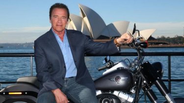 The man and the machine: Arnie poses in Sydney ahead of the new <i>Terminator</i> film premiere.