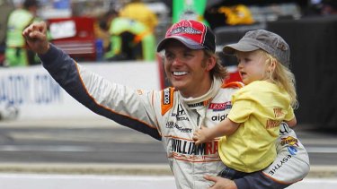 Tragic loss ... Dan Wheldon, pictured with his son after winning this year's Indy 500.