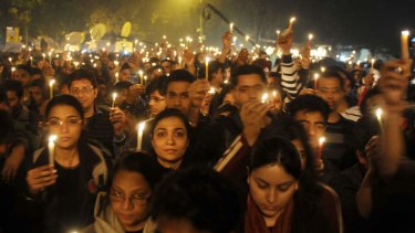 Indian protesters hold candles during a rally in New Delhi late 2012, after the death of a gang rape victim.