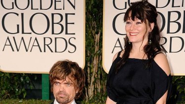Trending topic ... Peter Dinklage arrives at the awards with Erica Schmidt.