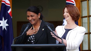 Nova Peris and Julia Gillard share a joke.