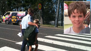 Distraught students were picked up early from St Patrick's College after 12yo Elliott Fletcher (inset) died of stab wounds.