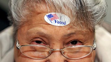 I voted ... Dora Winter of Nampa, Idaho, shows off her sticker after voting.