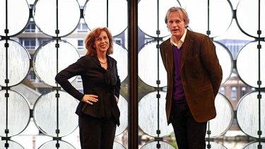 RMIT vice-chancellor Margaret Gardner and architect Sean Godsell in front of the sandblasted glass discs that pivot according to weather conditions.