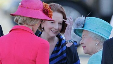 Governor-General Quentin Bryce and Prime Minister Julia Gillard chat with Her Majesty after touching down in Canberra.