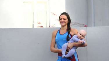 Canberra netballer Jemma Johnston with her son Samuel.
