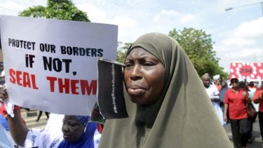 Widespread anger ... A woman chants slogans at a rally calling for the release of missing Chibok school girls at the state government house, in Lagos, Nigeria.