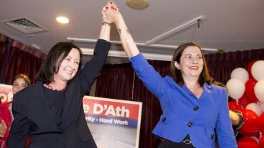 Labor candidate Yvette D'Ath claims victory in the Redcliffe byelection. She is joined on stage by state opposition leader Annastacia Palaszczuk.