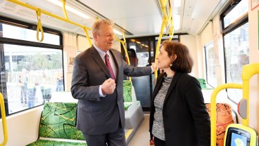 Victorian Energy Minister Lily D'Ambrosio with Al Gore on one of Melbourne's soon to be solar-powered trams.