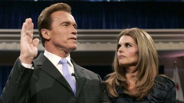 Happier times...Schwarzenegger with wife Maria, being sworn in as governor.