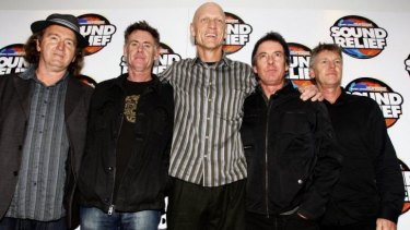 Midnight Oil: then-MP Peter Garrett (centre) and drummer Rob Hirst (second from right) at 2009 Sound Relief Victorian bushfire appeal.