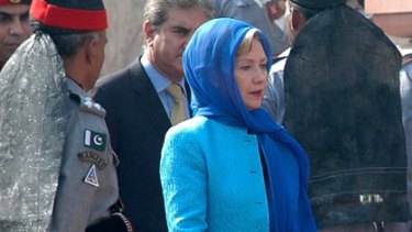 US Secretary of State Hillary Clinton wears a tradition ranger while being escorted by Pakistani Rangers during a state visit.