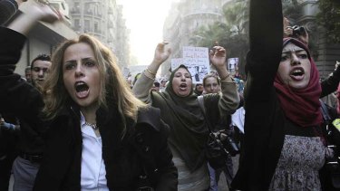 Women protest in Cairo after the police brutality.