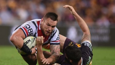 Jared Waerea-Hargreaves of the Roosters is tackled.
