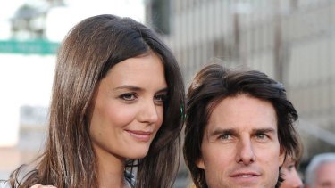 Tall order ... fans are questioning if Tom Cruise, pictured with wife Katie Holmes, has the stature for his new role.