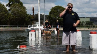Walking on water in Woy Woy: king tide inundates a low-lying pier on Tuesday.