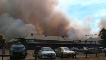 'Kilometres of front': A view of Saturday's fires from  Winmalee shops.