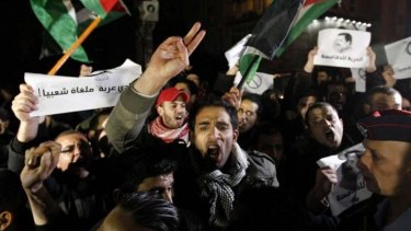Protesters demonstrate near the Israeli embassy in Amman against the shooting of the judge.