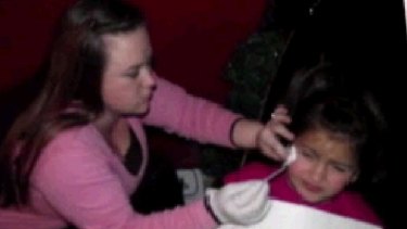 Eight-year-old Britney Campbell can be seen receiving a botox injection from her mum in this screen grab from Good Morning America.