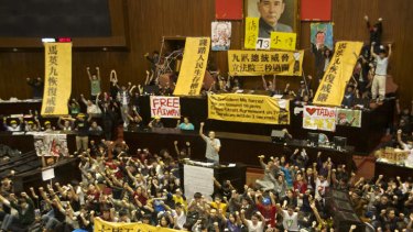 Seeds of discontent: Students protesting against a trade pact with China that was rushed through parliament take over Taiwan's Legislative Yuan, starting the Sunflower Movement.