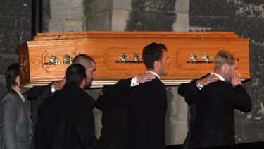 Goodbye to a beloved bandmate and friend ... Boyzone’s Ronan Keating, right, helps  carry Stephen Gately’s coffin into St Laurence O’Toole Church, Dublin.