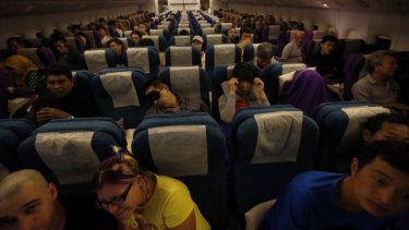 Passengers on Malaysia Airlines MH318 flight from Kuala Lumpur to Beijing.
