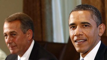 Deficit reduction differences ... US President Barack Obama, right, and Republican leader John Boehner discuss raising the US debt-ceiling.