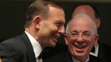 Prime Minister Tony Abbott meets political commentator Gerard Henderson at the National Press Club dinner.