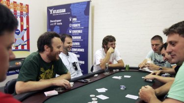 The Atlassian team enjoy a break from the daily grind at their poker table.