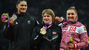 New Zealand's Valerie Adams, left, on the podium with her silver.