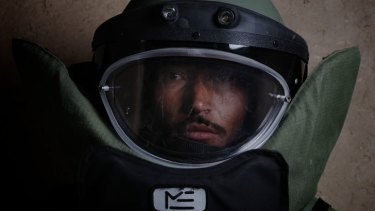 Afghan Explosive Ordnance Disposal (EOD) technician, Sergeant Major Mohammad Naim, at Multinational Base Tarin Kot, on 24 April 2013.