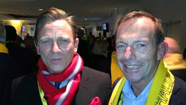 ''Funny who you run into at a big game!'': Daniel Craig with Tony Abbott in a picture the Opposition Leader posted on Twitter.