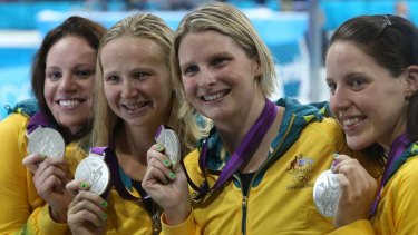 Glory ... Emily Seebohm, Melanie Schlanger, Leisel Jones and Alicia Coutts with their silver medals for the 4 x 100m medley relay.