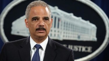 US Attorney-General Eric Holder announces the indictments.