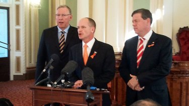 Deputy Premier Jeff Seeney, Premier Campbell Newman and Treasurer Tim Nicholls front the media at Parliament today.